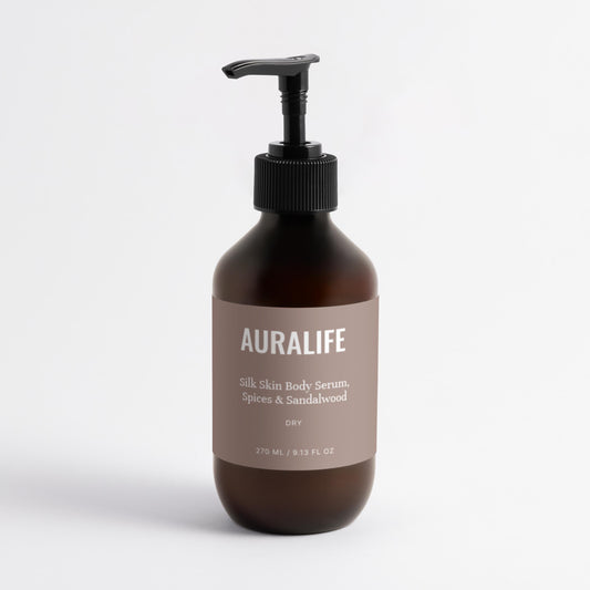Bottle of Auralife lotion on a white background